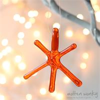 Orange Transparent fused glass star hanging decoration made by molten wonky