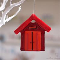 red fused glass beach hut
