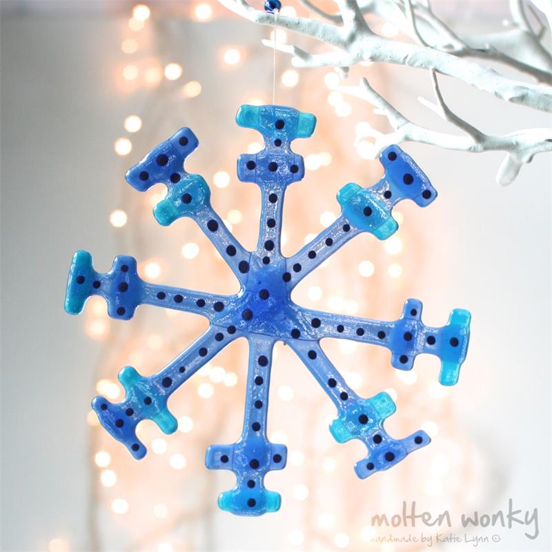 Blue fused glass snow flake hanging decoration made by molten wonky