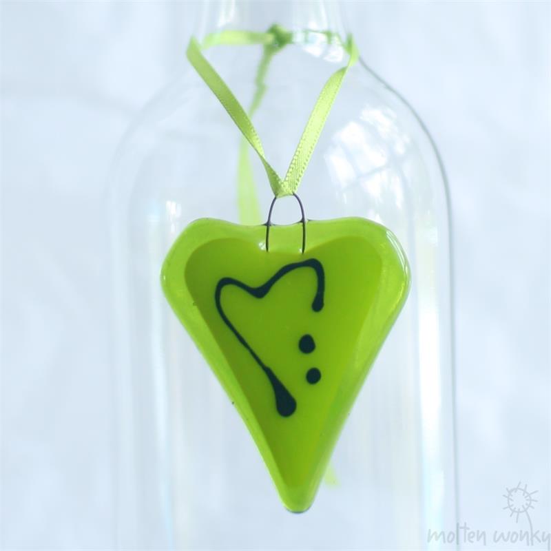 little green fused glass love heart hanging decoration made by molten wonky