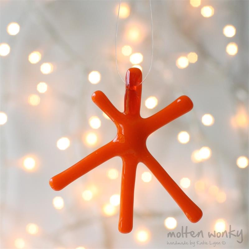 Orange Opaque fused glass star hanging decoration made by molten wonky